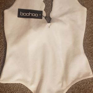 Cream/White, scalloped edge halter bodysuit.